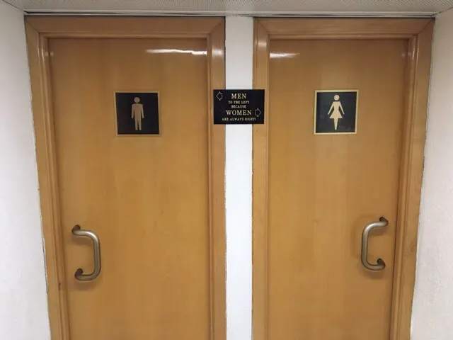 Funny sign at restrooms in hotel....