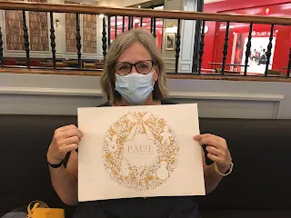 The placemat at Paul’s restaurant. The food was yummy but my companion, mask and all, was better!