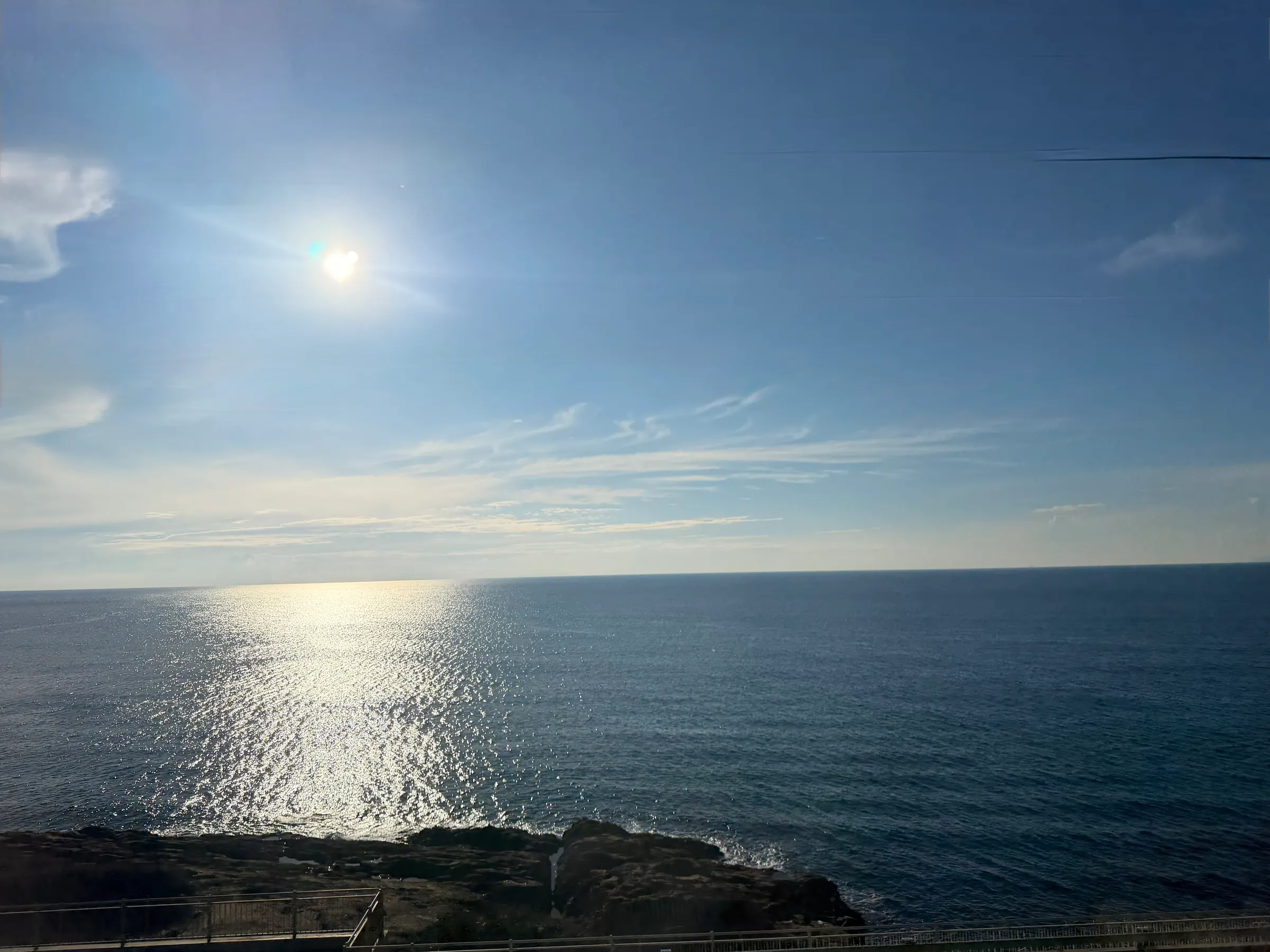Picture from our train looking out into the Mediterranean Sea. Lovely ride up the coast as the sun set.