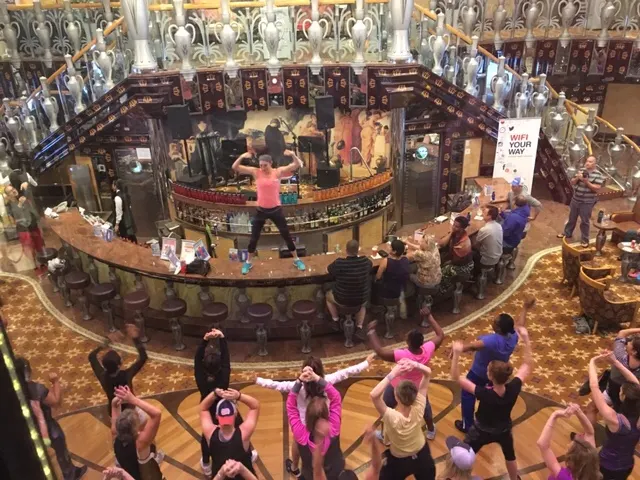 The Cruise Director leading Zumba....