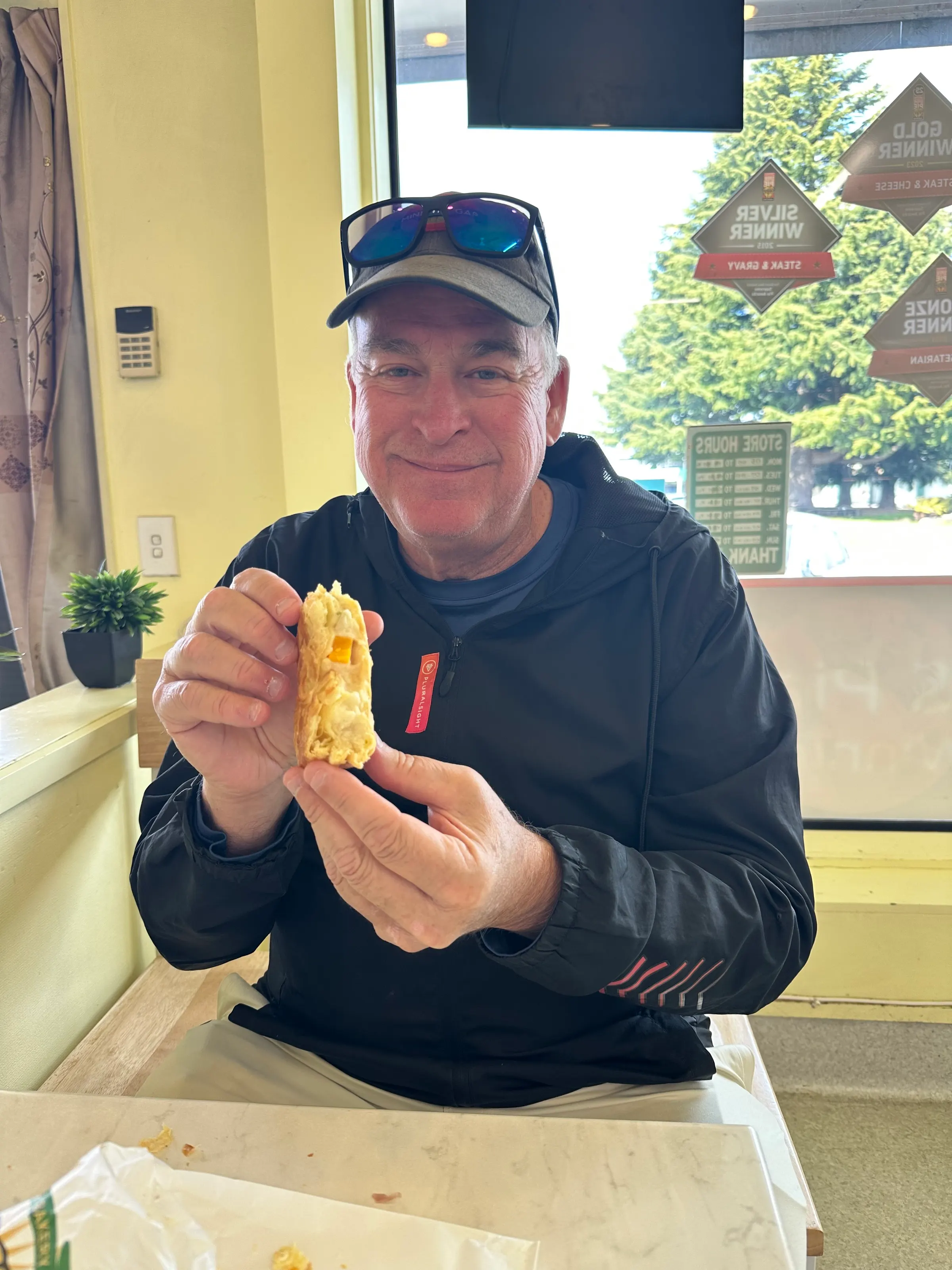 Showing off my Seafood Meat Pie. I thought it was pretty bland. Not a lot of flavor. Denise’s beef one had a lot more flavor.