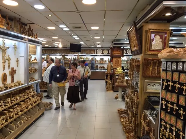 Exchanging filthy lucre. Crazy to go to Sacrament Meeting then end up here having thiefs hound you to buy their wares...that you usually find later down the street much, much cheaper. Don't get me started.