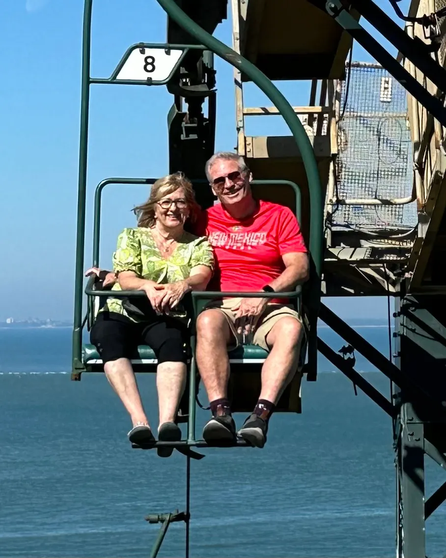 Pat and Lisa enjoying the lift up the hill.