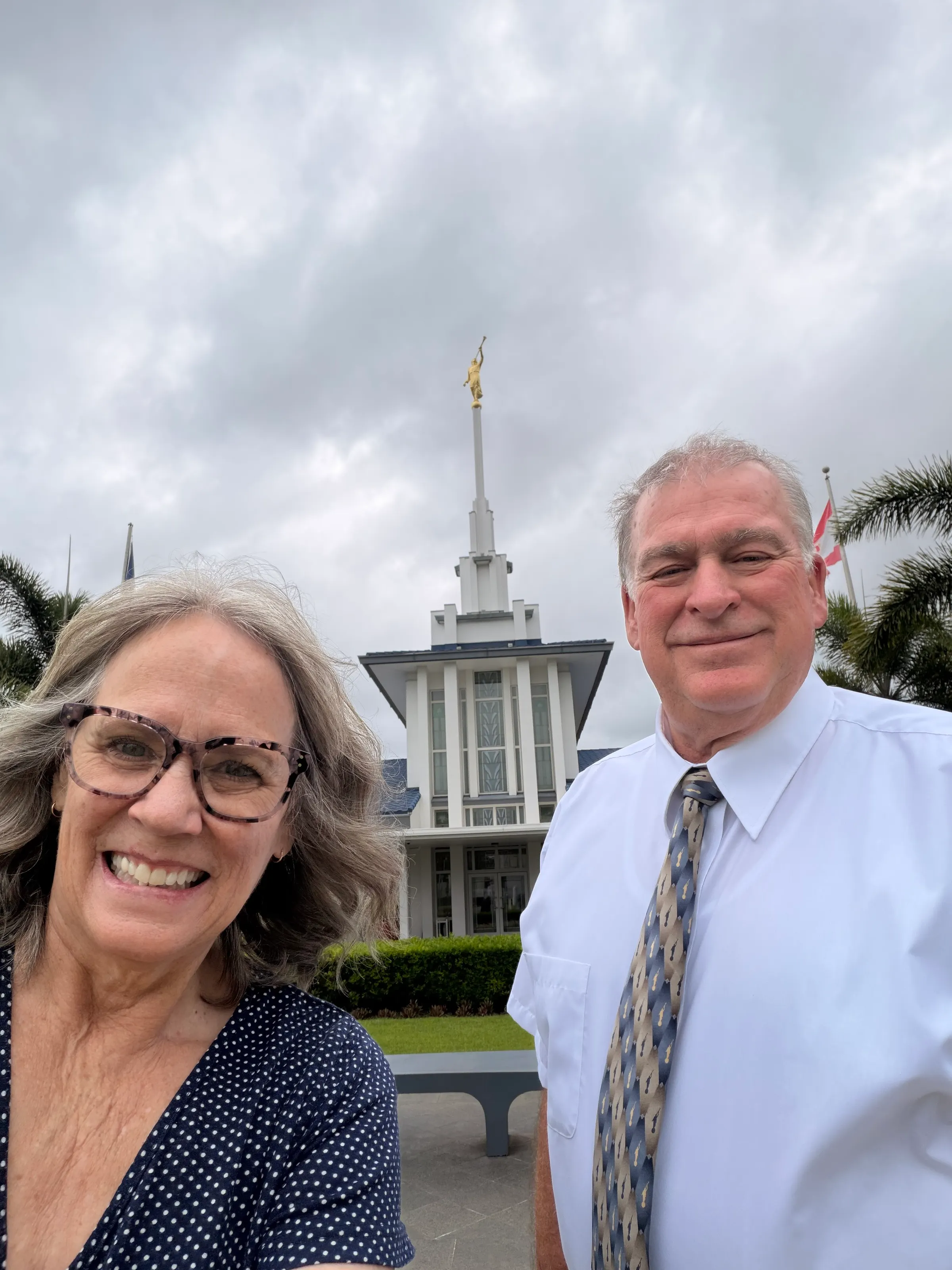 Us in front or the Tahiti temple. That shirt and tie was put on by the car in the temple’s parking lot.