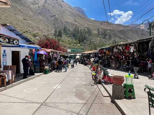 This is at Ollantaytambo train station. We had to leave the station and walk a bit through these tiendas to our bus\van. We actually picked up a an empanada to share even though we could not eat on their van. But we did anyway as quietly as possible.