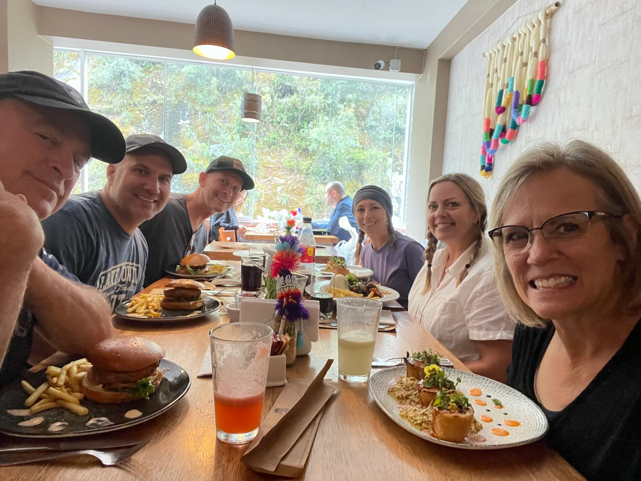 Us about to enjoy a late lunch, early dinner. Our host took us directly to this restaurant. We did not ask him to do that. We did tell him that we were hungry. So he acted on it and took us here. It was a really nice, and busy, eatery.