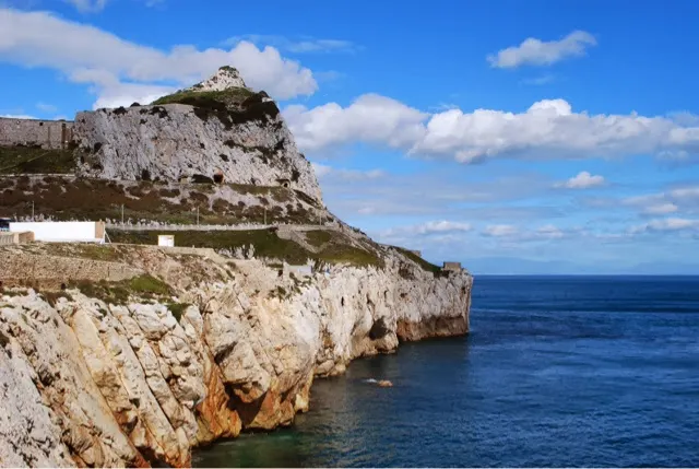 The rocky cliff looking into the sea.