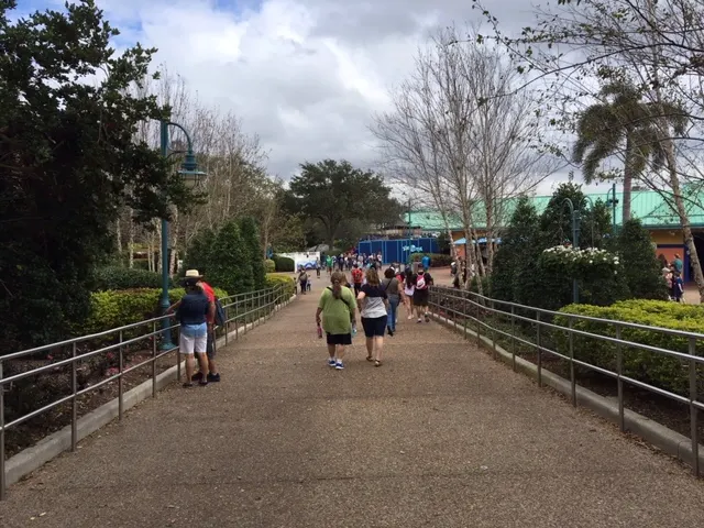 Pretty average distance between the men and the theme park enthusiasts! We were doing what you do at these places...walk and walk and walk, then wait and wait and wait. Nice day though!
