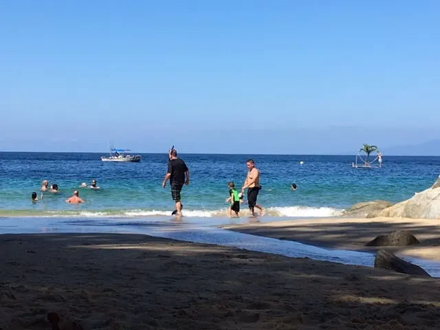 The small beach and cove by the restaurant....you can see me walking out to sea to snorkel.